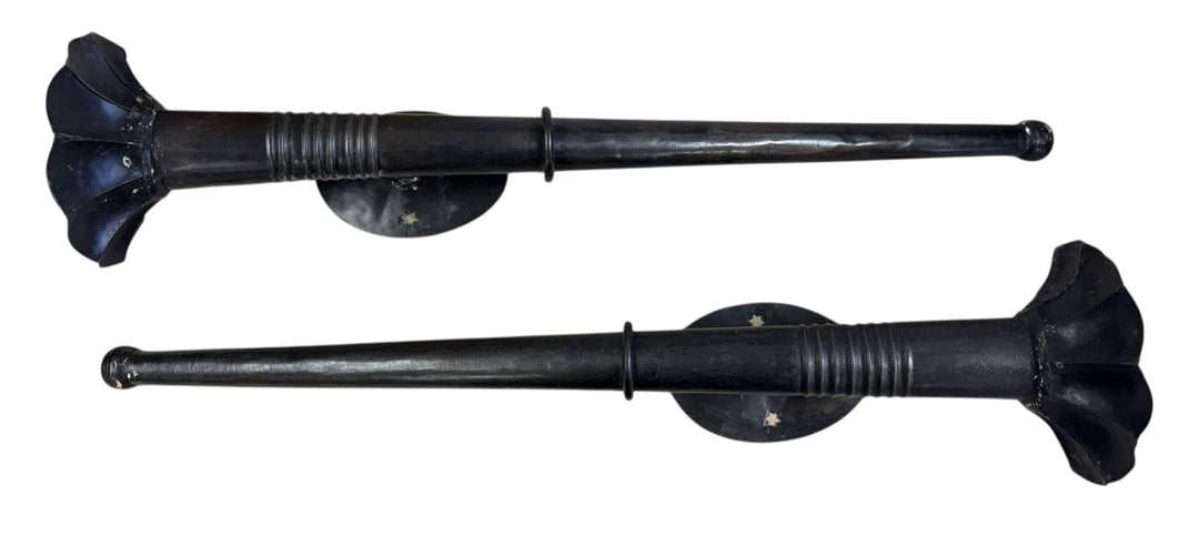 Pair of large wall mounted candlesticks, in the form of torches,