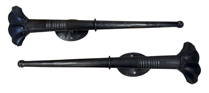 Pair of large wall mounted candlesticks, in the form of torches,