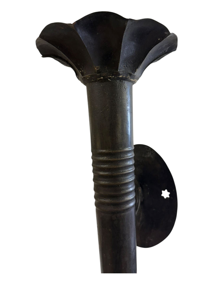 Pair of large wall mounted candlesticks, in the form of torches,