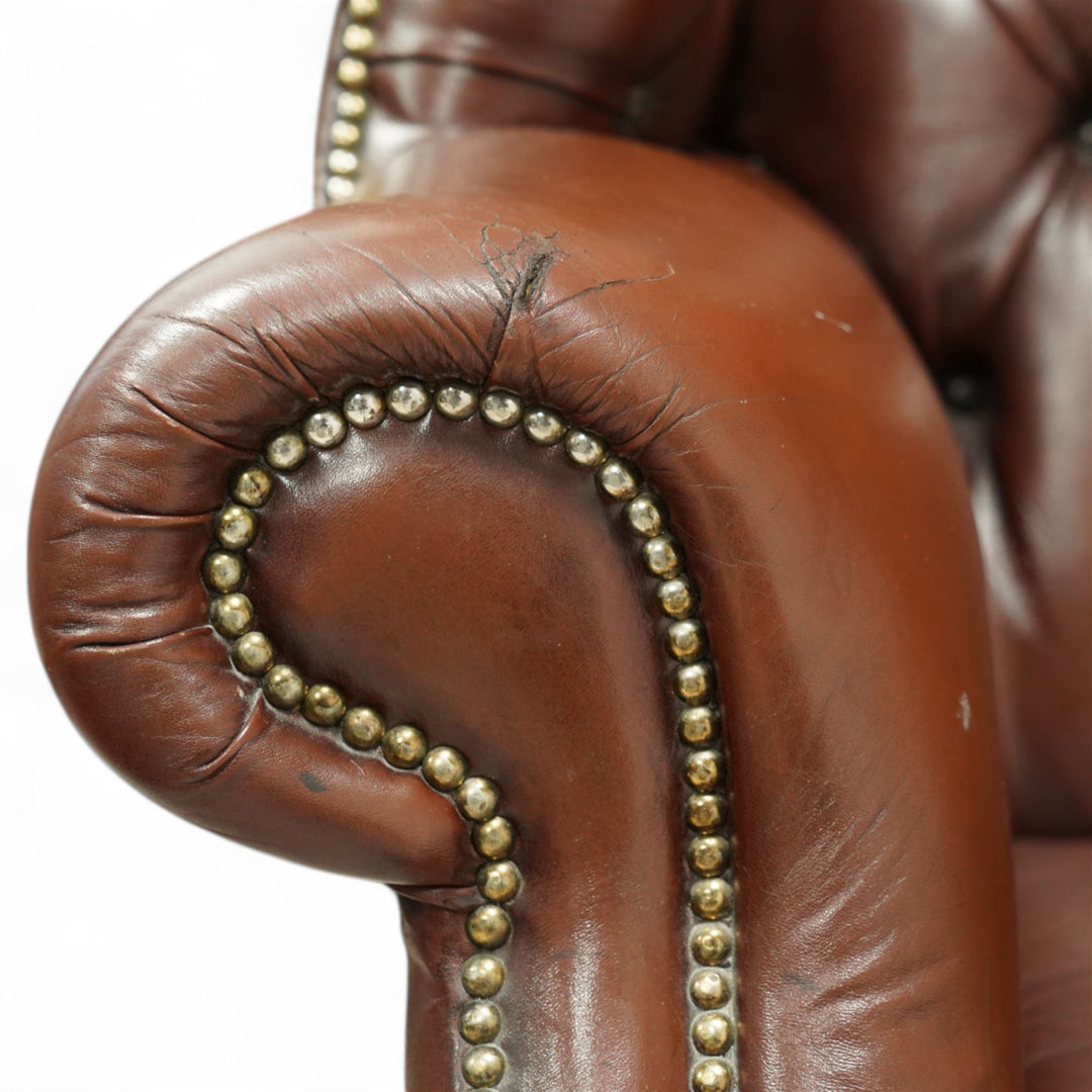 Georgian style leather winged armchair