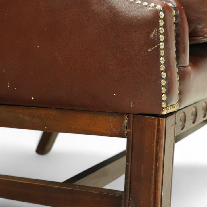 Georgian style leather winged armchair