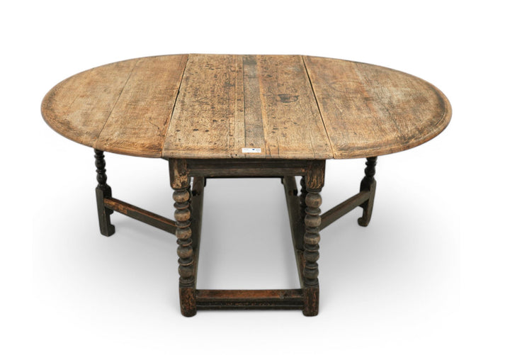 17th Century oak drop leaf dining table
