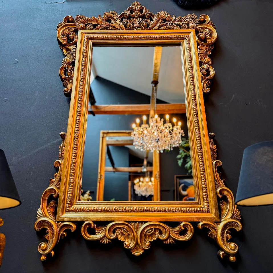 Ornate gold floral mirror