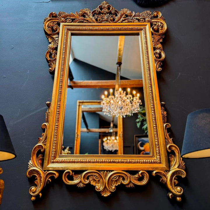 Ornate gold floral mirror