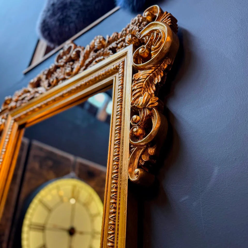 Ornate gold floral mirror