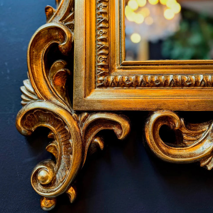 Ornate gold floral mirror