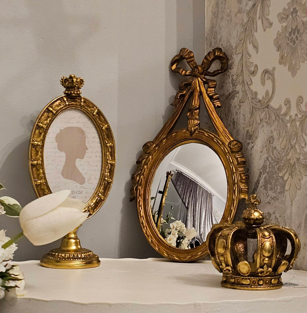 Antique gold ornate ribbon bow convex mirror