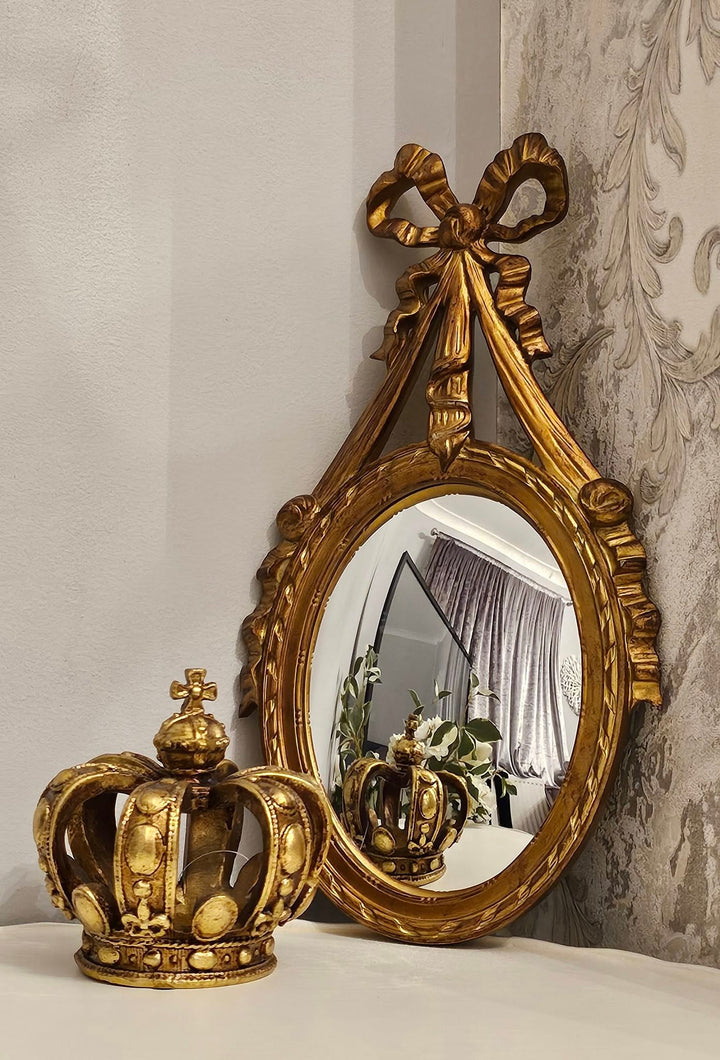 Antique gold ornate ribbon bow convex mirror